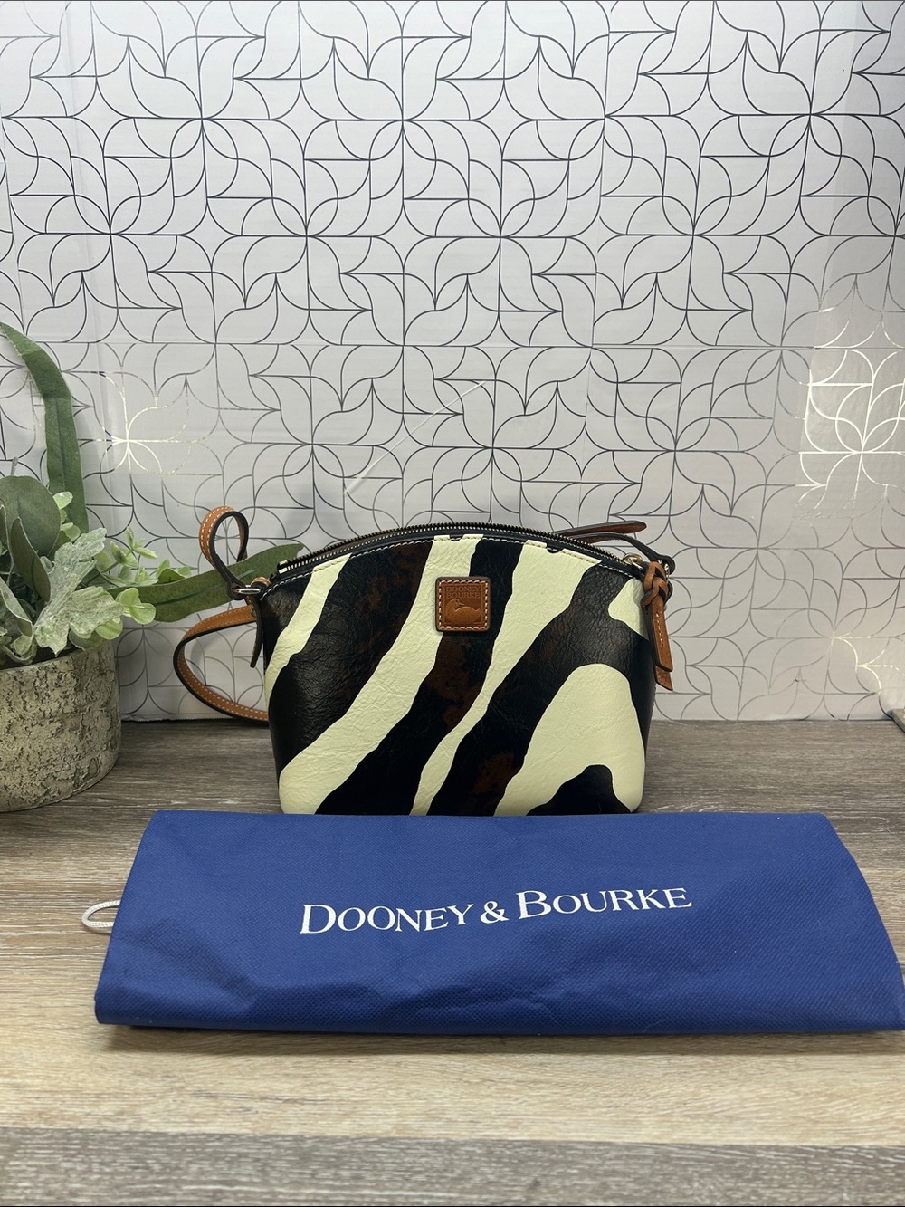 Dooney & Bourke Black and Cream Zebra-Print Crossbody with Tan Trim